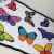 Speelkleed gekleurde vlinders Deluxe - Liefboefje
